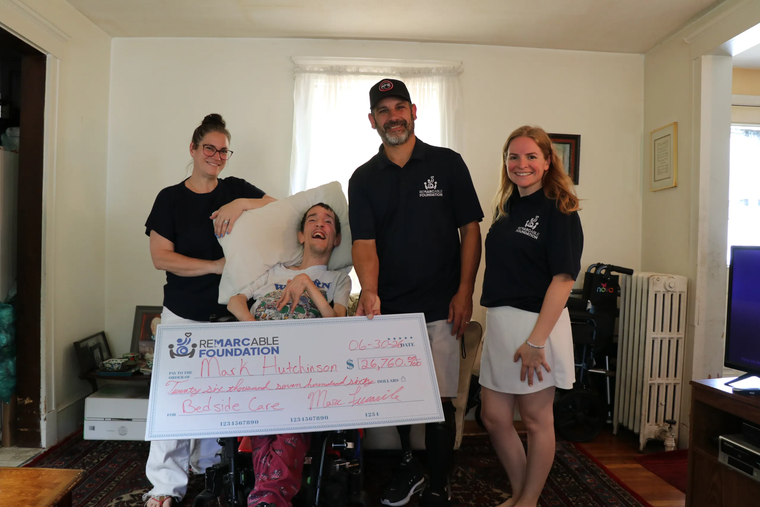 Donation presentation for Mark Hutchinson at the Woburn charity gala