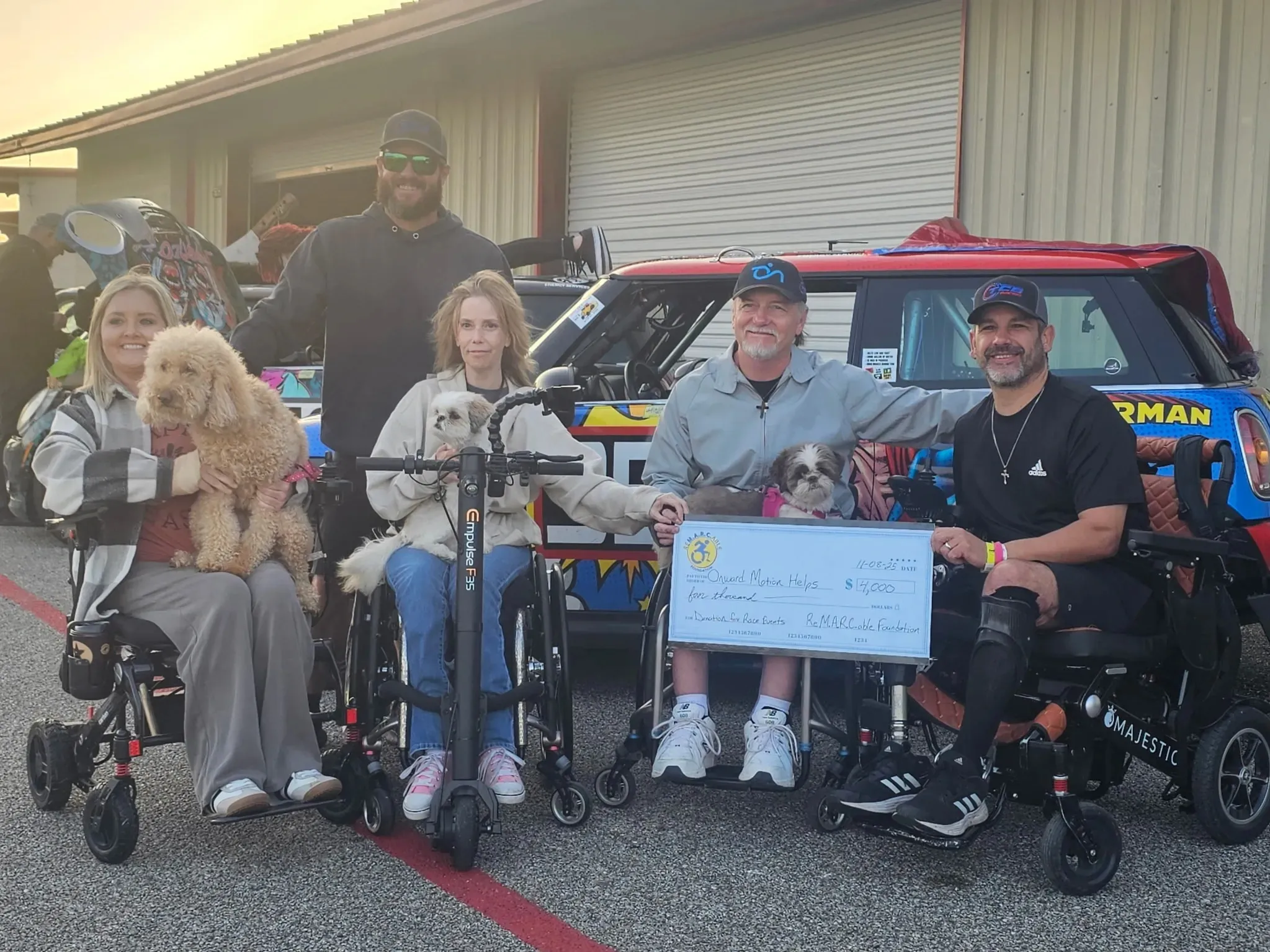 Marc Fucarile presents a $4,000 disability nonprofit grant to Onward Motion Helps